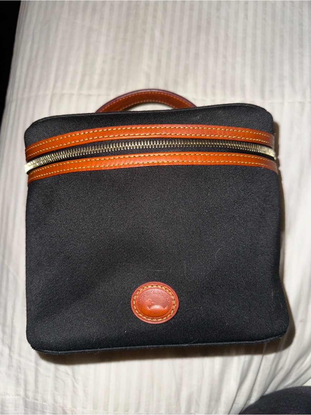 Dooney & Bourke Black Canvas Travel Case with Brown Leather Accents